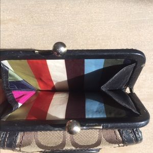 SOLD.   Coach signature Brown 100% authentic